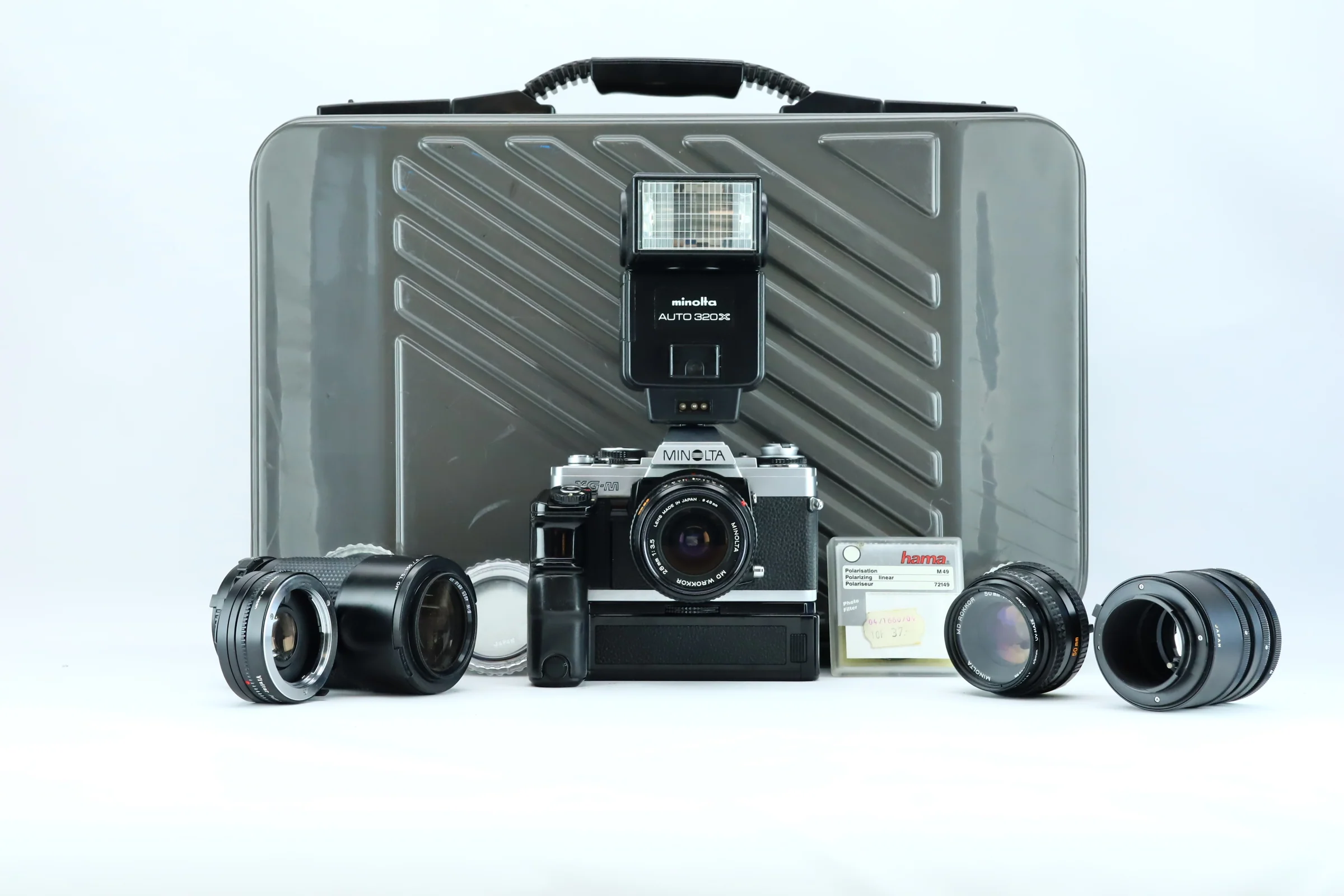 Minolta XG-M Set – 28mm, 50mm, 75–150mm + Grip + Teleconverter